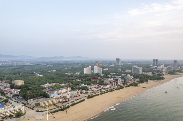 秦皇岛西双版纳旅游：从北方海滨到南方热带的奇妙之旅，一场说走就走的冒险，探索中国最神秘的热带雨林和独特的傣族文化